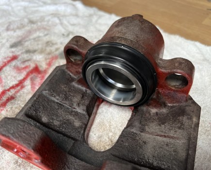 New caliper piston and seal installed
