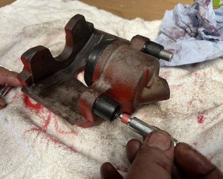Installing new brake caliper slider pins