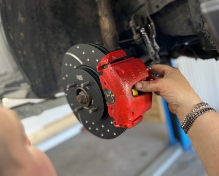 refitting brake caliper to a car