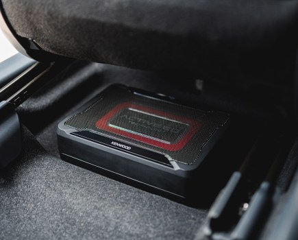 Kenwood underseat subwoofer in position under seat