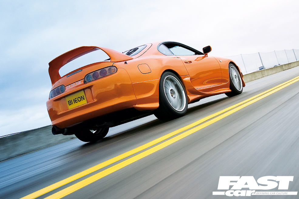 Toyota Supra JPS Motorsport Driving rear 3/4