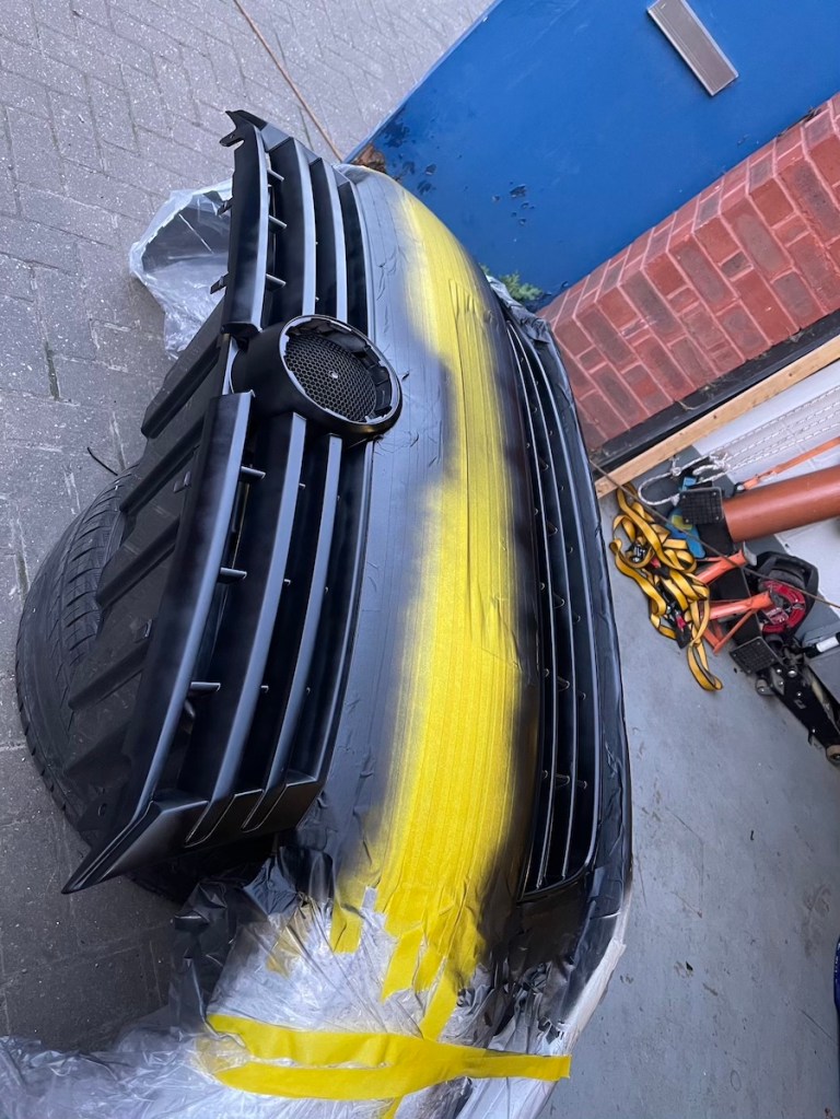 Painting Caddy grille black
