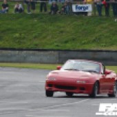 Mazda Miata MX-5 NA drifting on track