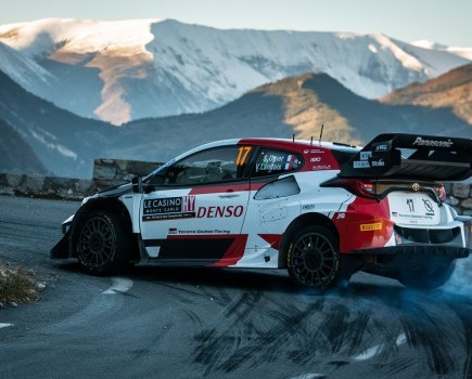 Seb Ogier sliding his Yaris around a hairpin at the 2023 Rallye Monte-Carlo.