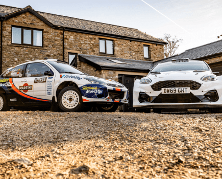 Focus WRC parked next to Fiesta Rally2 car